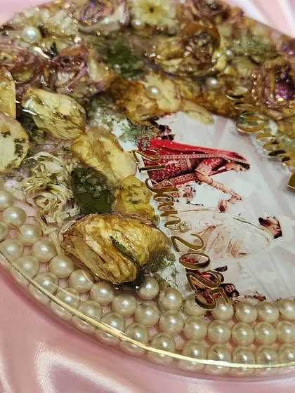 Another angle of the varmala preservation for Mansi and Sagar, showcasing the pearl border and intricate details.