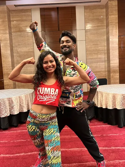 With ZES Shiv Kewat. It was a pleasure working with him at a corporate event. I love flexing my non-existent biceps.