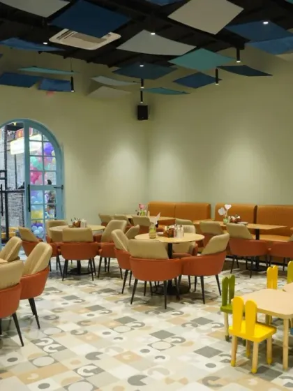 Our party area is ready for guests. The space is a blank canvas that we can transform for any theme, with both adult and child seating ready.