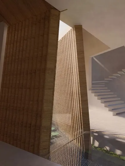 An interior view of the Cumin Residence showing a staircase and a slatted wooden screen that allows light to filter through while creating a sense of partial enclosure.