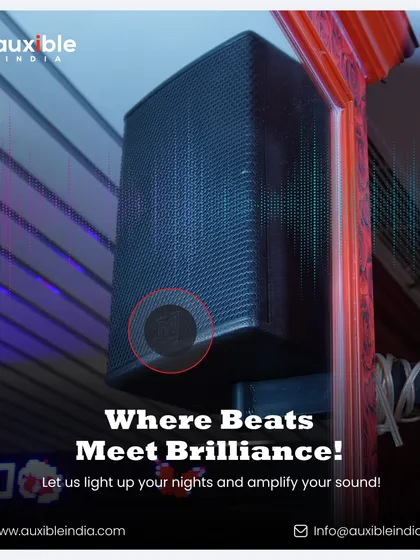 This is where beats meet brilliance. A close-up of a wall-mounted professional speaker, strategically placed to deliver optimal sound coverage, complemented by atmospheric LED lighting in the background.