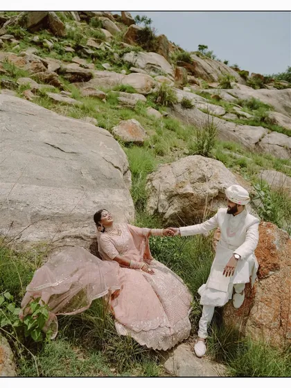 A playful and tender moment set against a rugged, natural landscape. Our pre-wedding shoots are a mix of epic scenery and intimate, candid interactions.
