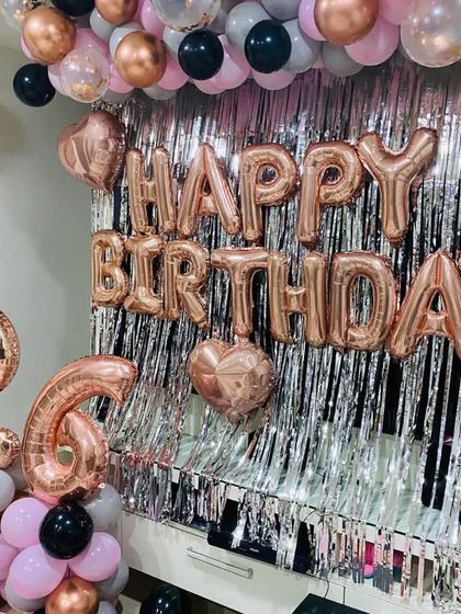 This angle shows the full backdrop for the 26th birthday celebration.