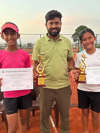 Rumi with her opponent and a tournament official in Mohali.
