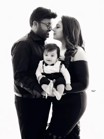 A beautiful black and white version of a classic family pose, adding a timeless and artistic feel.