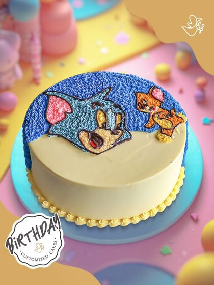 A classic Tom and Jerry cake, capturing the timeless chase in sweet, edible form. The hand-piped character art makes this a nostalgic and fun choice for all ages.