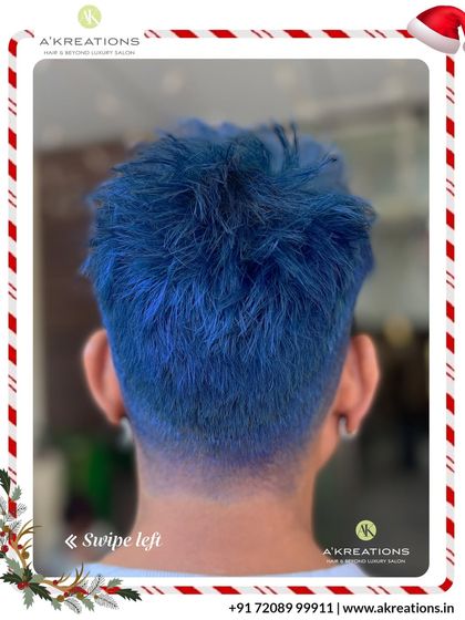 This vibrant blue hair color makes a statement. We ensured the tone was rich and even, complementing the textured haircut perfectly.