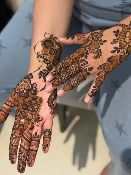 The rich stain of the modern Indo-Arabic design shown earlier. The dark color makes the geometric and floral patterns stand out beautifully.