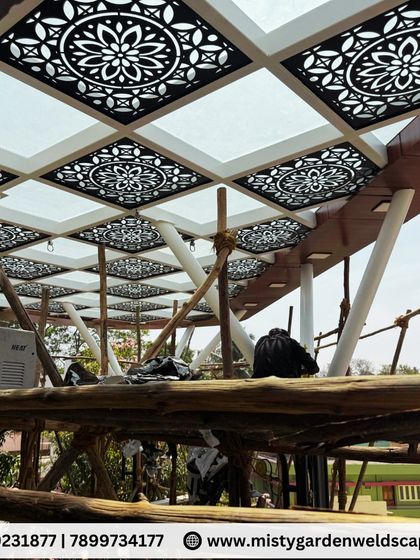 For this project, I designed and installed an architectural pergola using 12mm toughened glass and intricate CNC designer panels. The structure is supported by custom pillars, creating a luxurious and visually striking centerpiece for the terrace.