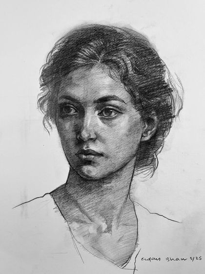 The final graphite portrait sketch. A sketch can speak volumes, capturing a mood and presence with just lines and shading.