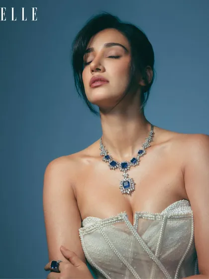 A serene and stunning makeup look for Disha Patani's ELLE India digital cover. The focus was on luminous skin and soft, smoky eyes to complement the magnificent sapphire necklace.