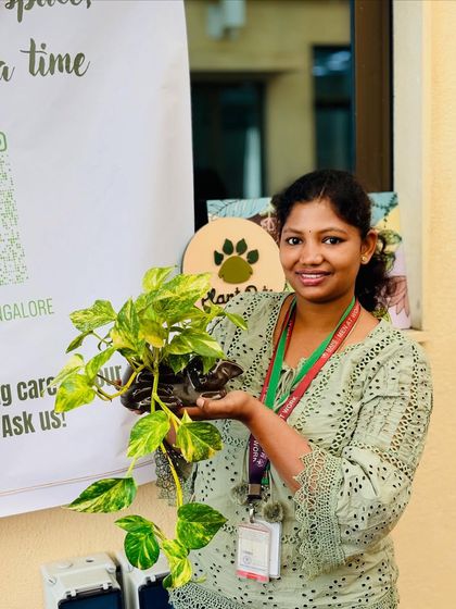 Another happy customer from our college event, holding her new Golden Pothos. Her smile says it all. Spreading the plant love is what we do.