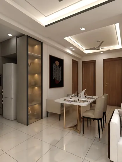 An open-concept layout connecting the living, dining, and kitchen areas. A glass display cabinet acts as a subtle divider, adding storage and style without closing off the space.