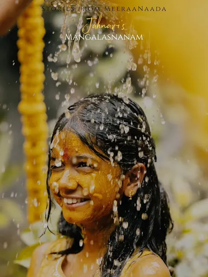 A beautiful portrait from a Mangala Snaanam ceremony, capturing a young woman's happy and serene expression.