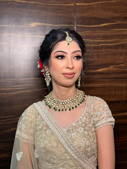 A captivating look for Kanika's Pheras. Her radiant glow and beautifully defined eyes were the focus of this elegant bridal makeup.