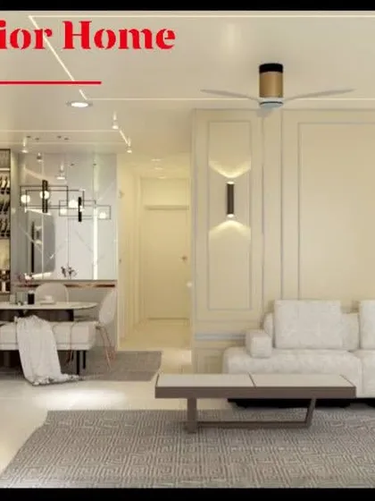 A comprehensive shot of the open-plan space, showing the TV unit, dining area with a wine rack, and living room seating. This demonstrates our skill in designing multi-functional spaces.