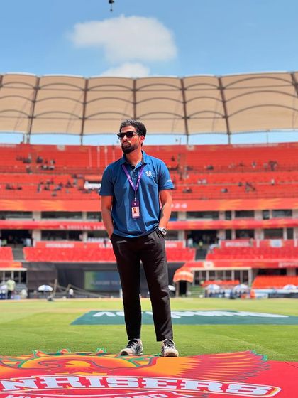 Standing on the Sunrisers Hyderabad logo on the field. It's a moment of pride and a symbol of being part of the elite Orange Army in the IPL.