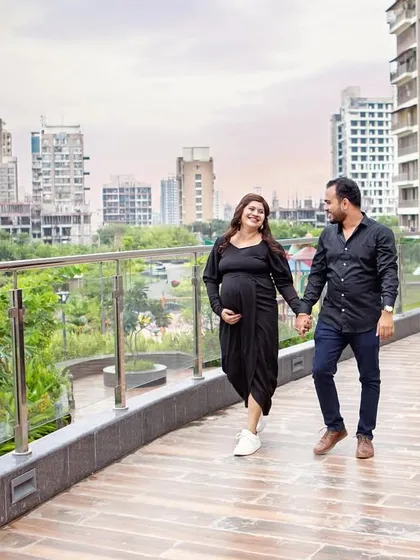 A casual walk with the city skyline in the background. This shows that we can find beautiful locations for an urban outdoor shoot right here in Navi Mumbai.