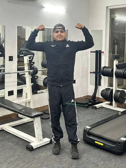 Flexing in the home gym.