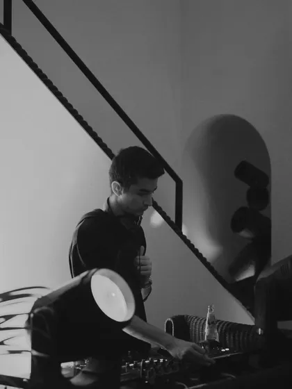 A quiet, focused moment in black and white. DJing is not just about the party, it's about the art of the mix.