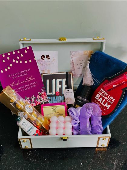 The fully packed bridesmaid trunk, ready to be gifted. This one includes Ferrero Rocher, The Body Shop soap, a bubble candle, and a cute journal.
