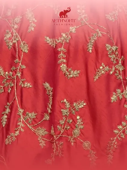 You can never go wrong with a classic red lehenga. This piece is my tribute to tradition, with intricate golden embroidery that feels royal. It's designed for the bride who wants that timeless, unforgettable look.