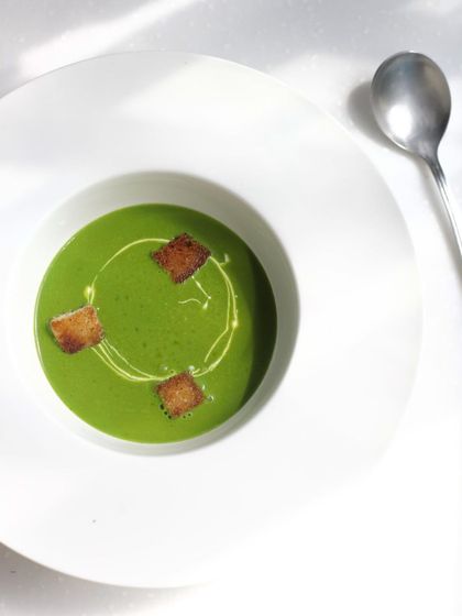 Another look at our beautifully presented green soup, a simple yet elegant starter.