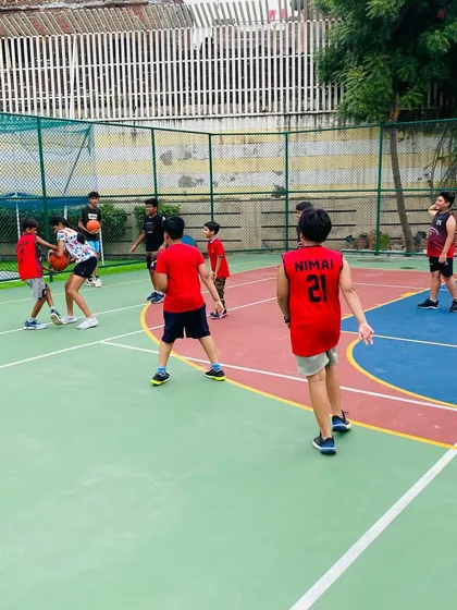 Players learn to pass and cut, a fundamental offensive action.