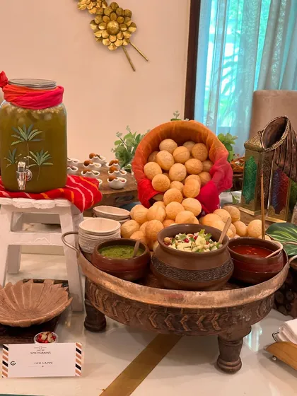 We love elevating classic Indian street food. Our live golgappe station is always a party highlight, presented with rustic elegance in wooden bowls and a traditional dispenser, making it a fun and interactive experience for guests.