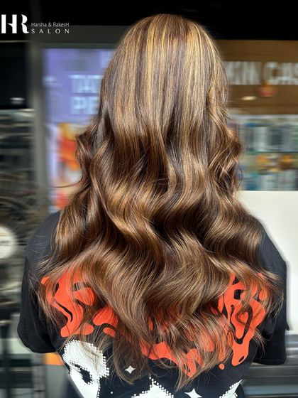 This client wanted a classic caramel balayage. The result is rich, warm, and full of dimension, styled into perfect waves.