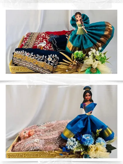 We love blending tradition with a creative twist. Here, we've artfully draped beautiful sarees to create these doll-like figures, turning a traditional trousseau gift into a memorable work of art for a Teej celebration.