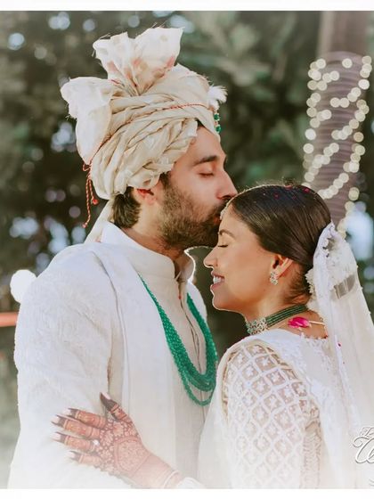 A tender forehead kiss, a gesture of love and protection. These are the quiet, heartfelt moments that I make sure are captured.