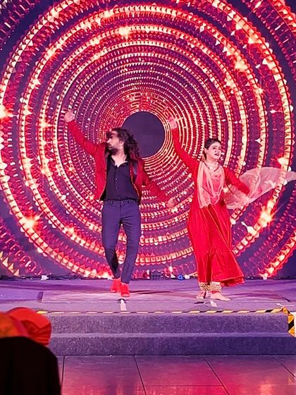 A joyful, high-energy moment from a Flamenco-Kathak live performance.