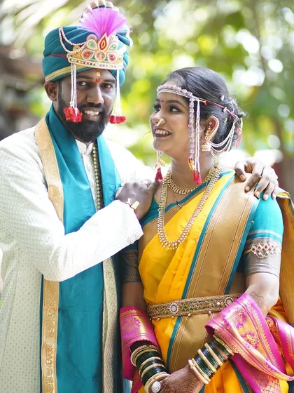 A happy and confident couple. The bride's makeup enhances her features, making her look and feel like the best version of herself.