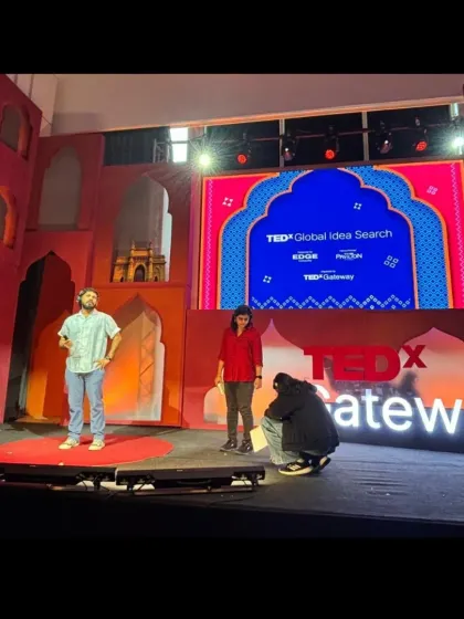 Our team on stage with a speaker during a rehearsal for TEDx Gateway. We provide on-the-spot support and direction to ensure speakers are comfortable and prepared.