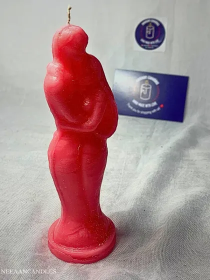 Two souls, one flame. This red hugging couple candle is another beautiful piece that captures a warm hug in wax.