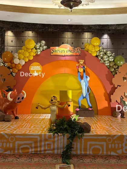 The full stage setup, capturing all the key characters like Rafiki, Simba, Timon, and Pumbaa in one frame.