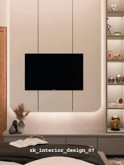 A minimalist bedroom TV unit with a simple floating console and a backlit side shelf. This design is ideal for smaller rooms where a clean, uncluttered look is desired.