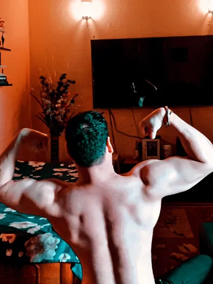 This is what an aesthetic, naturally built back looks like. My programs focus on developing the lats, traps, and lower back for that classic V-taper shape.