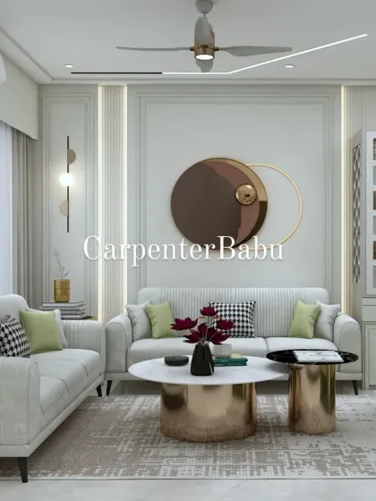 This living room features a mix of seating options and a striking gold and black coffee table. The circular wall art adds a modern, graphic element to the design.