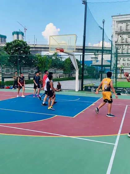 A player takes a shot during an evening game.