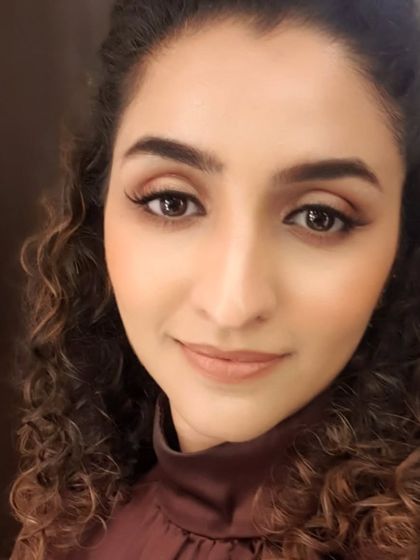 Another take on the popular 'latte makeup' look. The warm, coffee-inspired tones are universally flattering and create a look of understated, modern elegance.