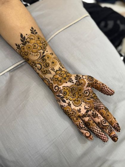 A full view of the back-of-hand floral design.