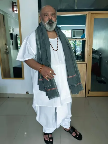 A full-length view of one of the looks I designed for Saurabh Shukla ji. The combination of a white dhoti-kurta and a simple grey scarf creates a distinct, grounded, and powerful village elder look.