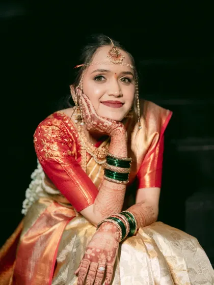 A candid, happy moment. The makeup is designed to be long-lasting and photo-friendly, ensuring she looks perfect in every shot, from posed portraits to candid captures.