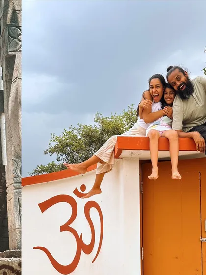 A playful moment with my family on the ashram roof. This is a place of love, family, and joy, where we live the principles we teach.