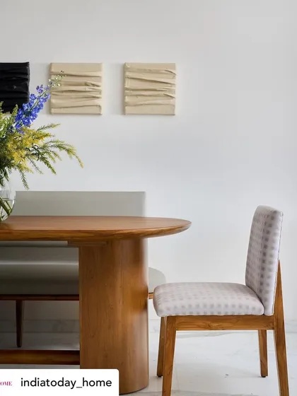 A detail shot from our 'House on the Hill' feature, focusing on the textures and materials in the dining area. The combination of wood, soft upholstery, and textured art creates a layered and sophisticated look.