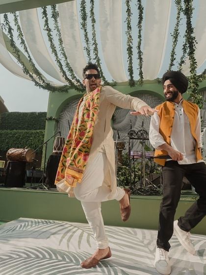 Nonstop energy. A great shot of me and a friend dancing at a daytime Mehendi event.