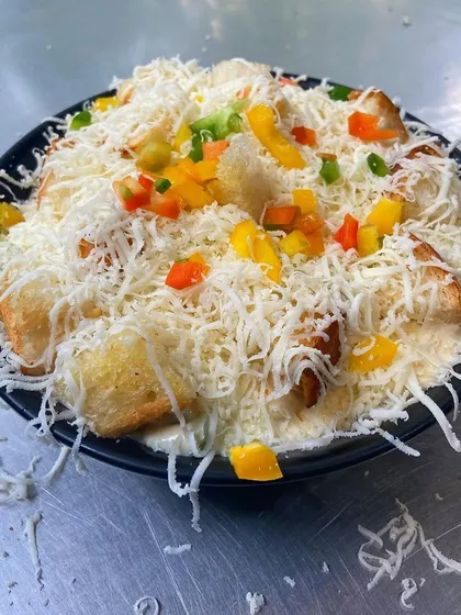 My Mac n Cheese Pasta is a cheese lover's dream. It's loaded with cheese and topped with colourful bell peppers.