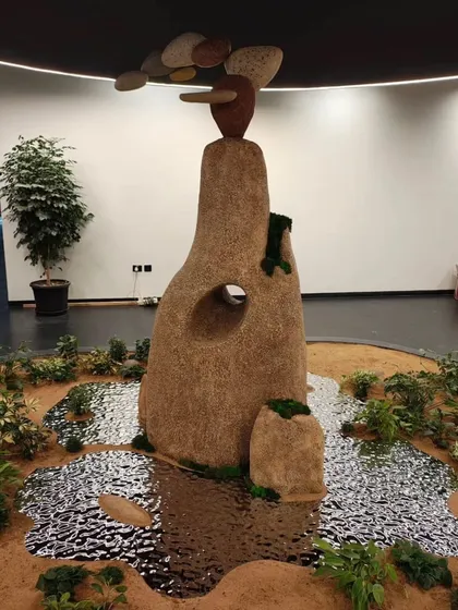 Art can be a powerful way to express a brand's values. This nature-inspired rock installation was created for a construction group to embody their commitment to eco-friendly practices, resilience, and integrity, blending sustainable art with corporate identity.